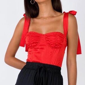 Red satin corset top from Lioness